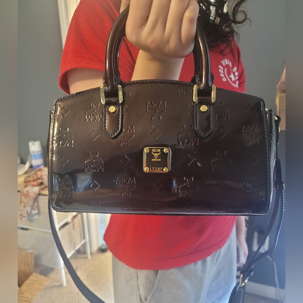 Authentic MCM Brown and Blue Satchel with Elegant Embossed Design